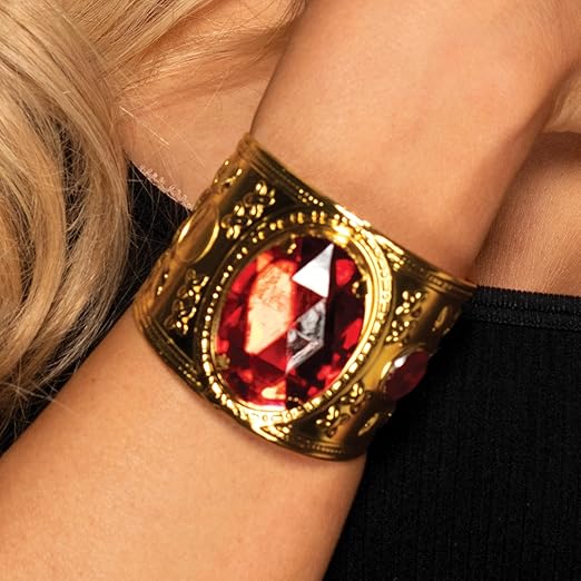 Pulsera de metal dorado con joya roja