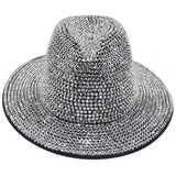 Sombrero de copa plateado con pedrería