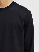 Camiseta negra de manga larga con cuello redondo