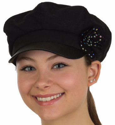 Gorra taxista con visera de piel sintética y flor de lentejuelas en el lateral
