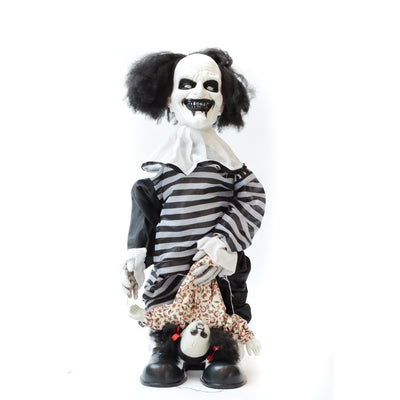 Payaso espeluznante con muñeca