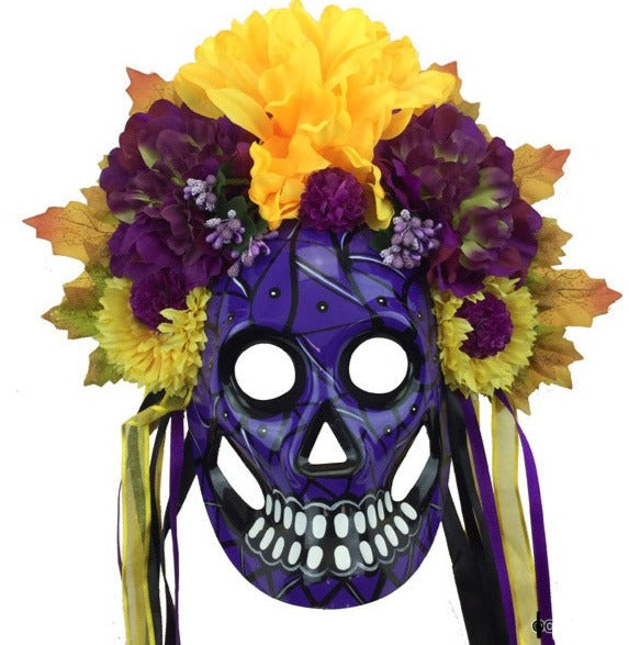 Día de Muertos morado con flores encima